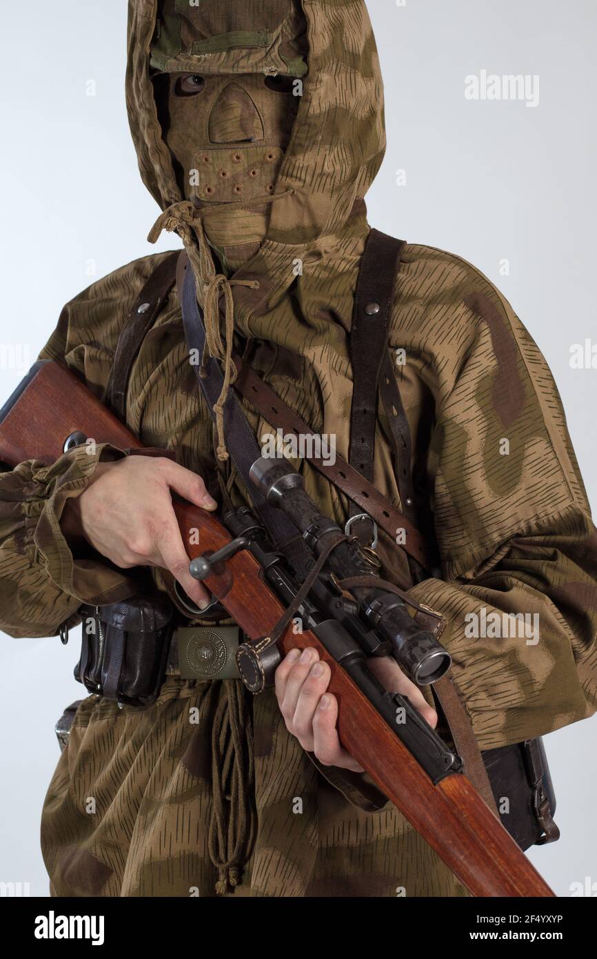 Actor man in old military uniform and camouflage sniper clothing of a soldier of the German Army during World War II Stock Photo Alamy