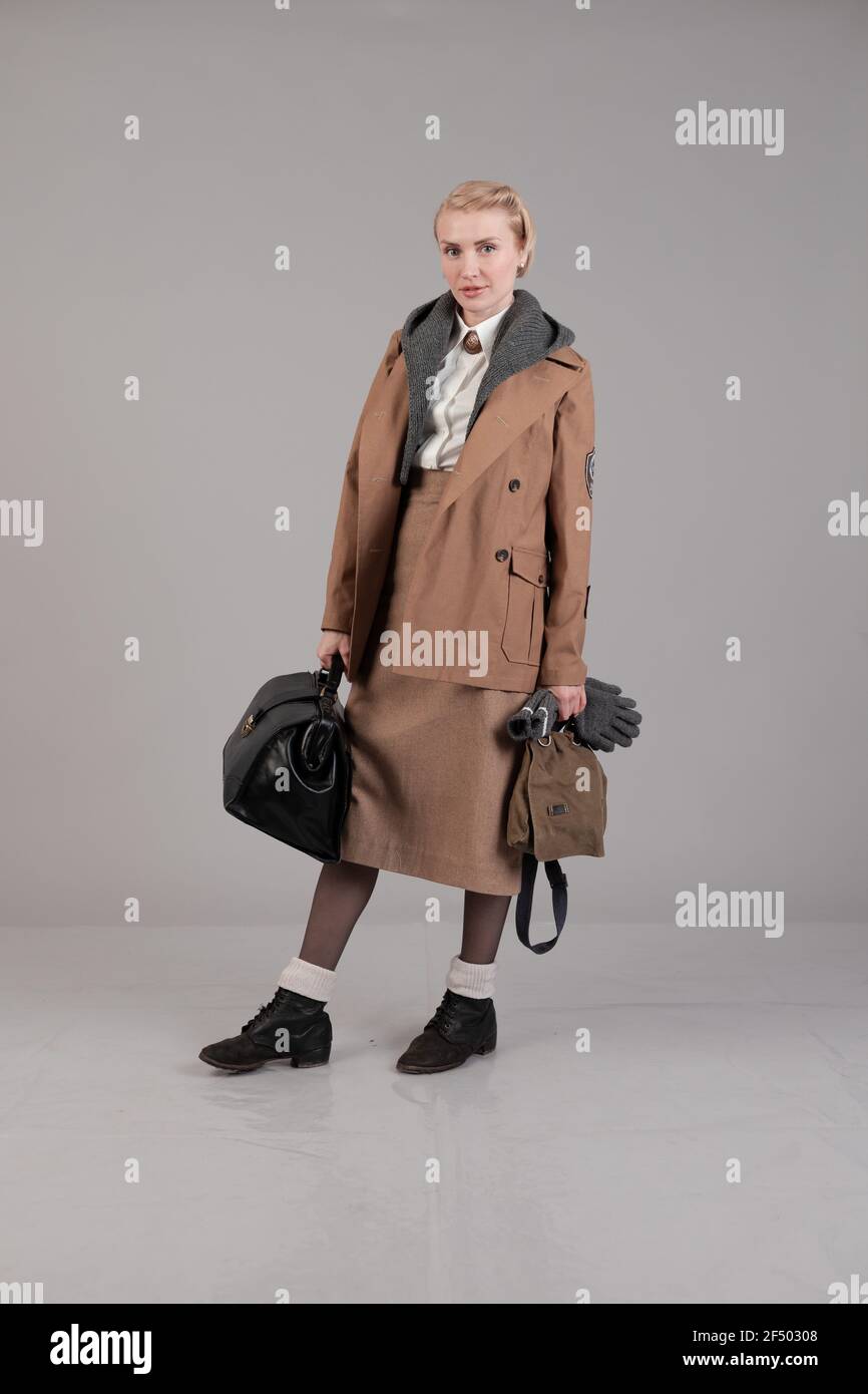 Woman Actor Reenactor In Historical Winter Clothes Rad Of The German Fashion During World War Ii