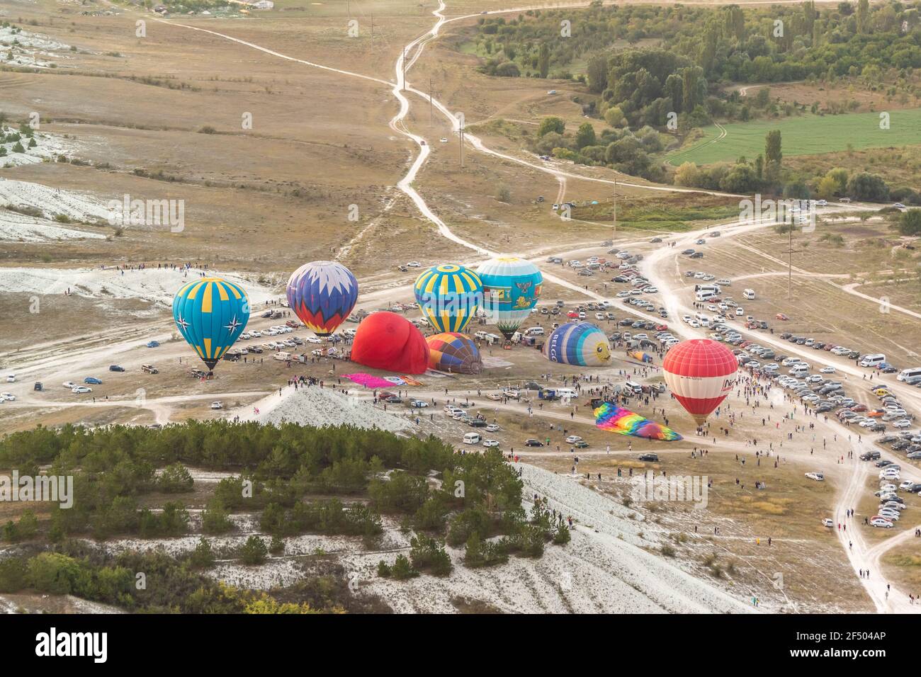 Russia, Crimea, Belogorsk September 19, 2020-Preparation for the launch of colorful balloons at the festival of aeronautics at the foot of Mount Belay Stock Photo