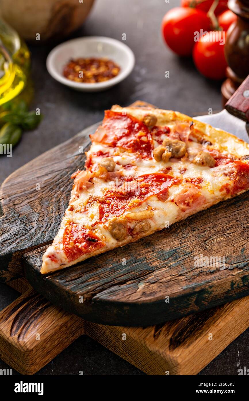Meat lover pizza with pepperoni, ham and sausage Stock Photo Alamy