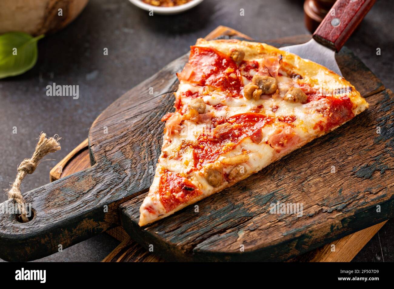 Meat lover pizza with pepperoni, ham and sausage Stock Photo Alamy