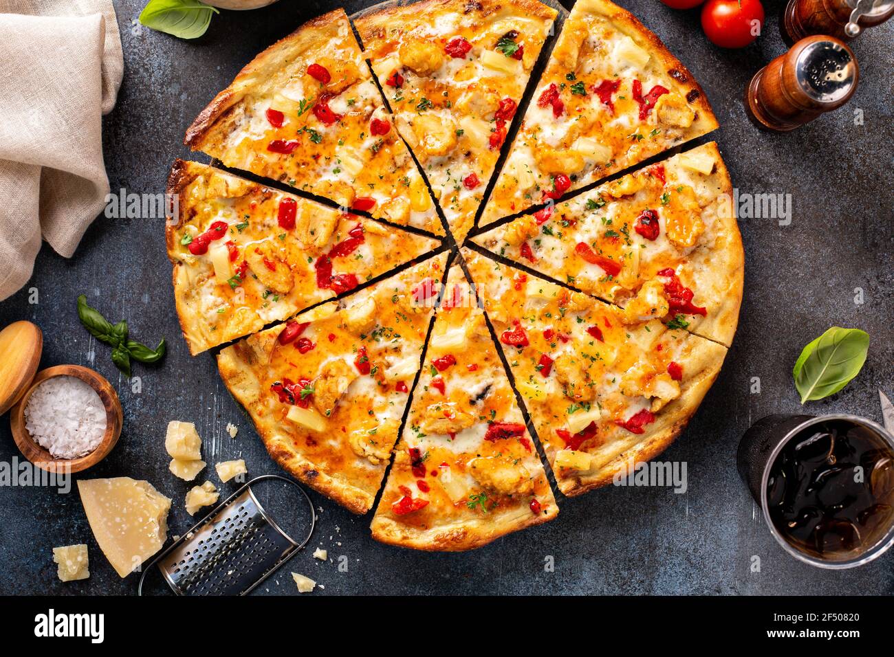 Hawaiian pizza with pineapple, ham and pepper Stock Photo - Alamy