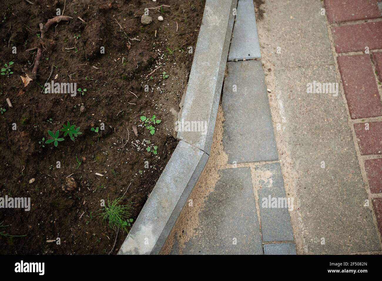 sagging paving stones. uneven pavement in the city square. sinking pavement of a pedestrian