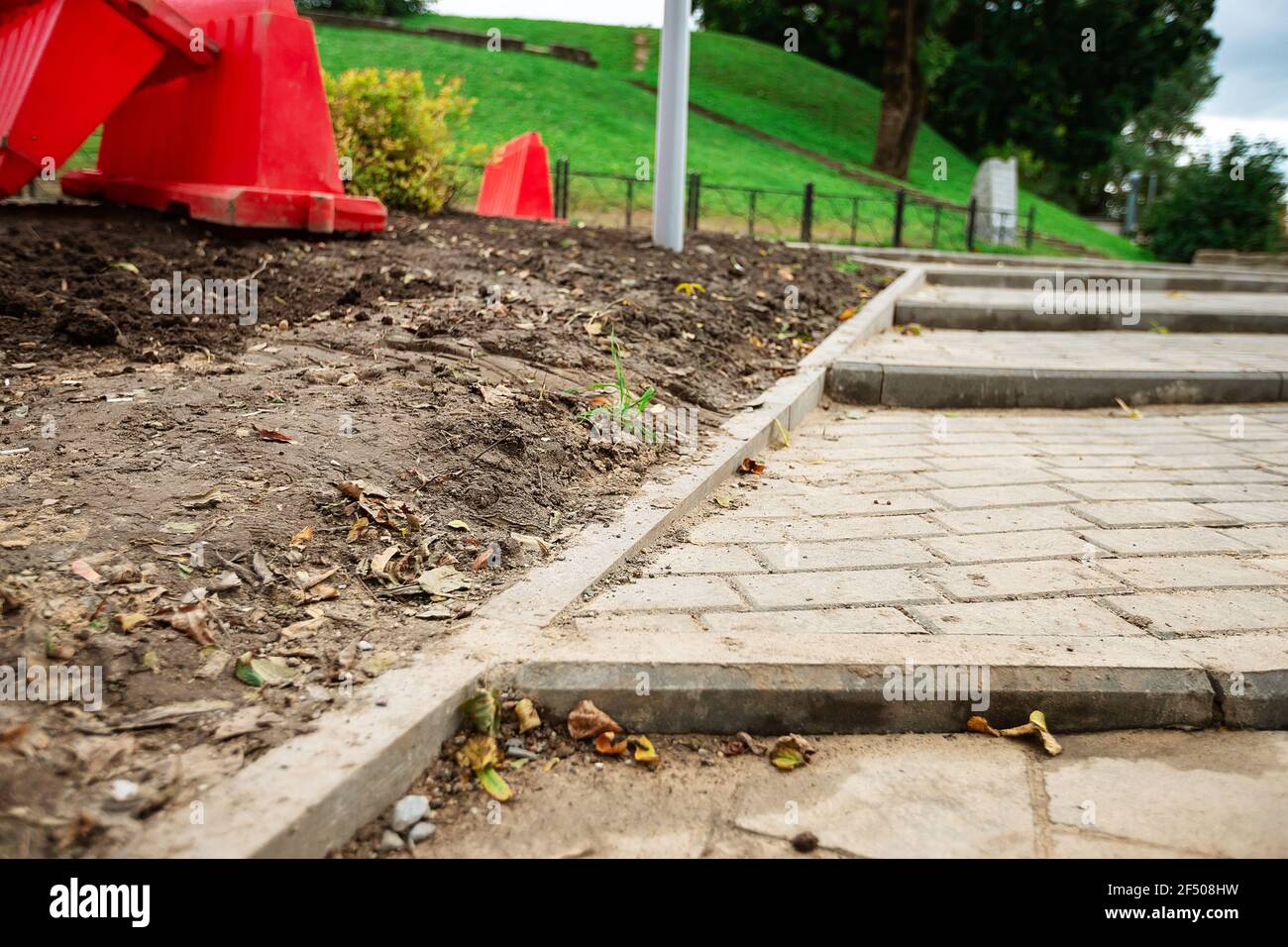 sagging paving stones. uneven pavement in the city square. sinking pavement of a pedestrian