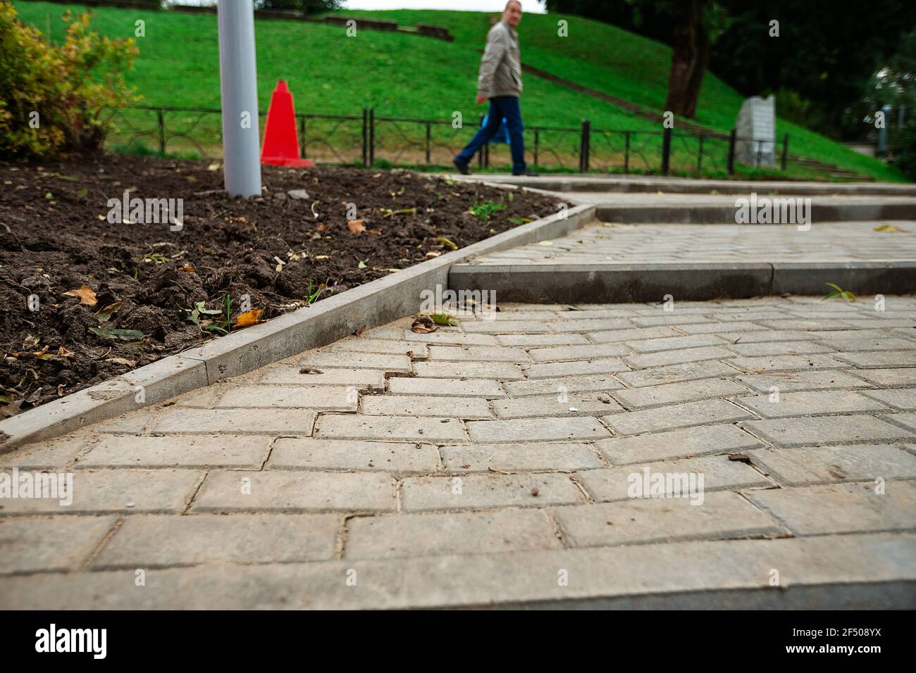 sagging paving stones. uneven pavement in the city square. sinking pavement of a pedestrian