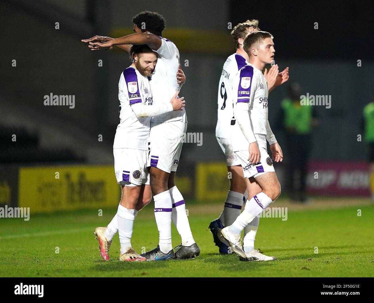Shrewsbury Town's Harry Chapman (left) celebrates scoring their side's second goal of the game with team-mates during the Sky Bet League One match at the Pirelli Stadium, Burton upon Trent. Picture date: Tuesday March 23, 2021. Stock Photo