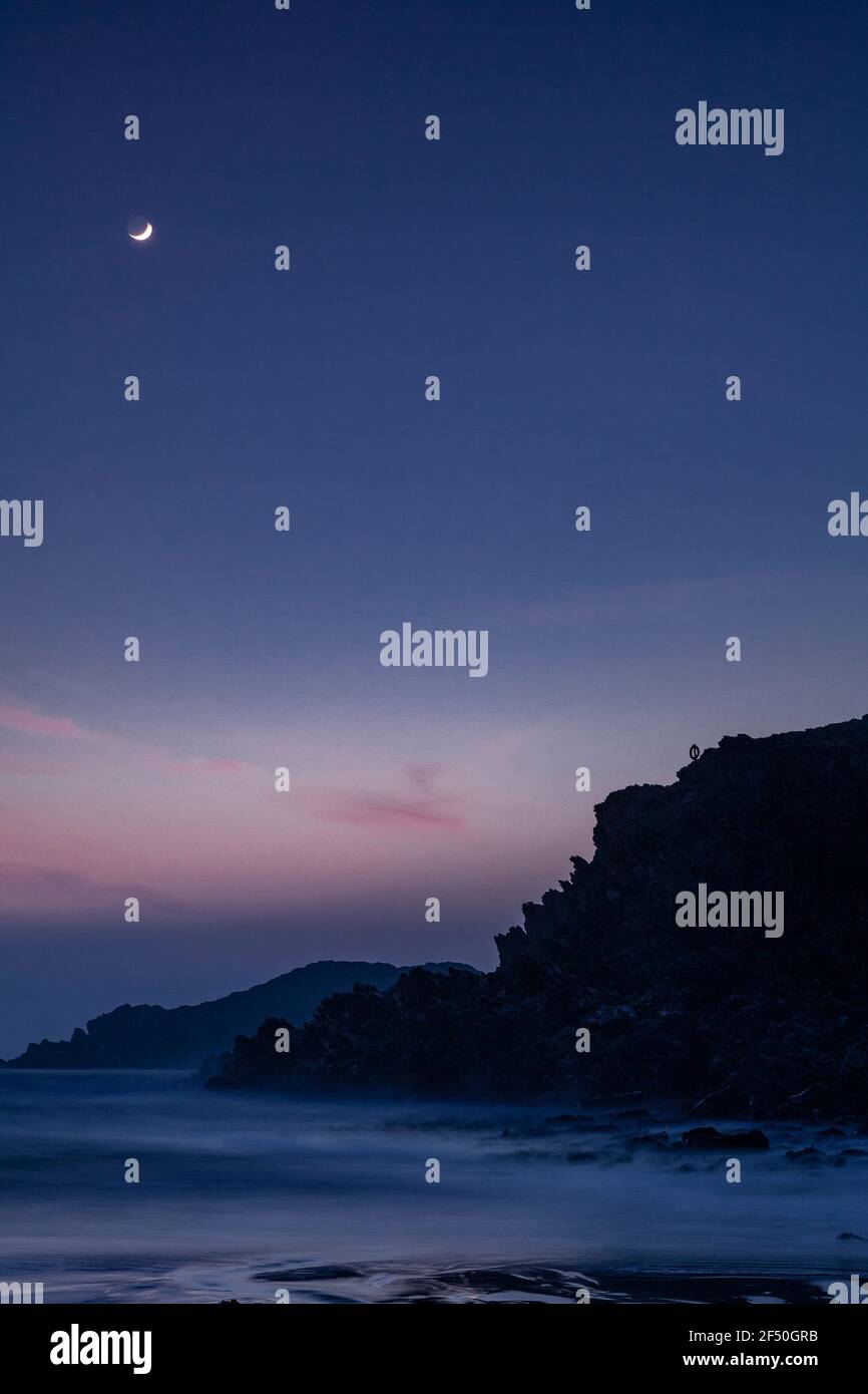 Trearddur Bay at low tide at dusk, Anglesey, North Wales Stock Photo