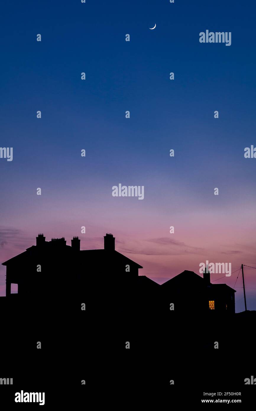 House at dusk, Trearddur Bay, Anglesey, North Wales Stock Photo