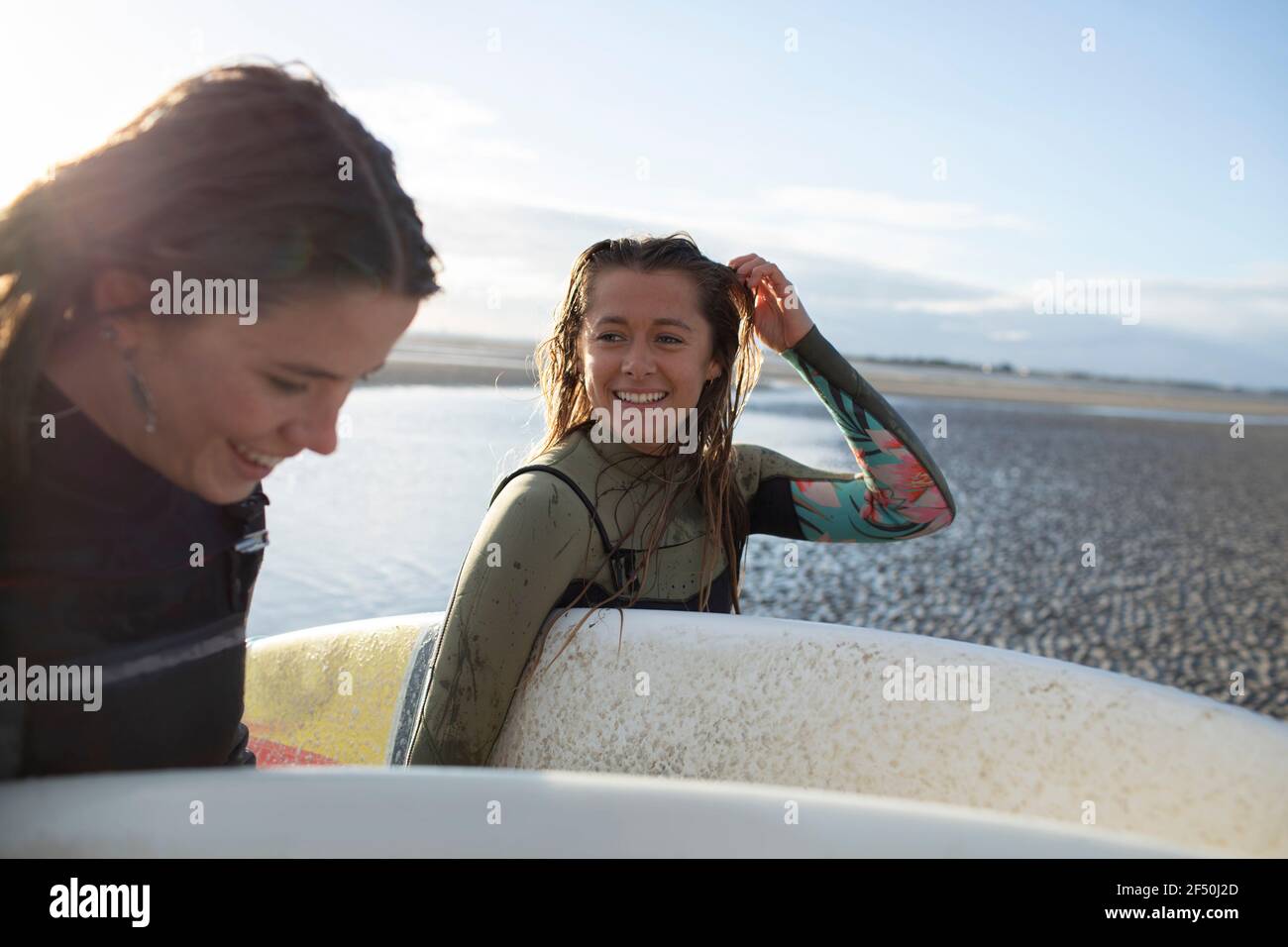 Woman surf surfing beach sunny hi-res stock photography and images - Alamy