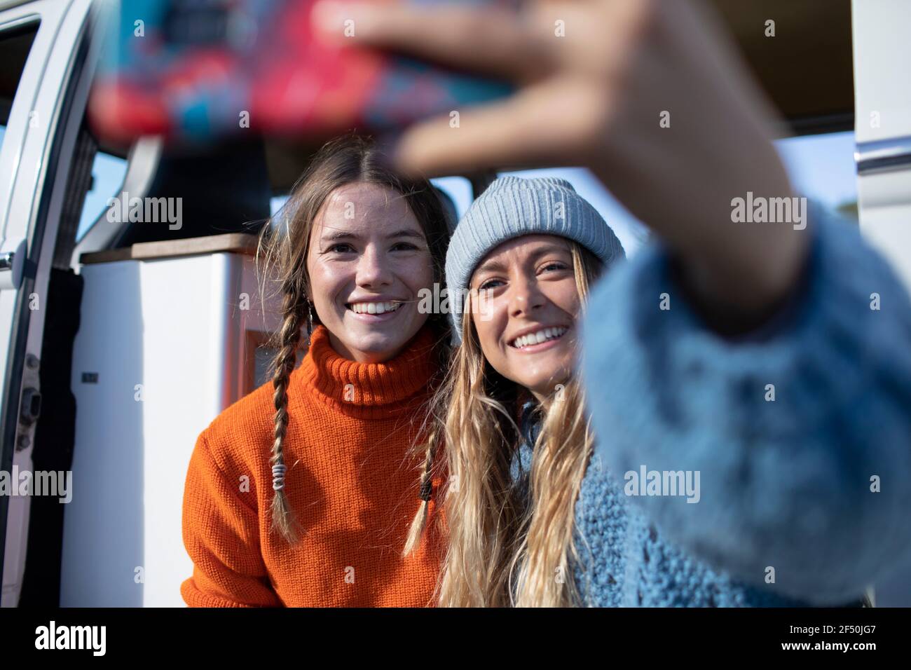 Happy young women friends taking selfie Stock Photo