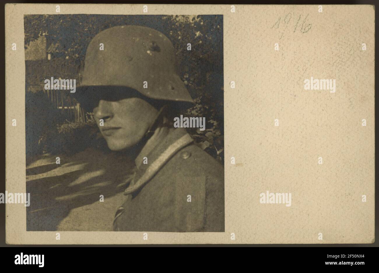 Portrait Otto Dix in uniform with steel helmet. Postcard to an unknown addressee, handwritten text with signature 'Otto Stock Photo