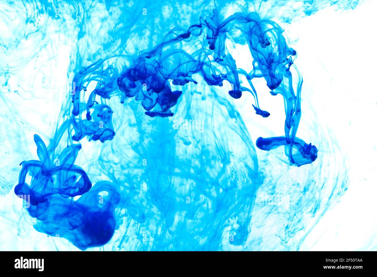 Abstract pattern falling into the water drop of blue ink Stock Photo ...
