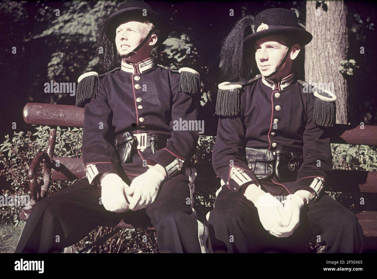 Two young men in historical uniforms Stock Photo - Alamy