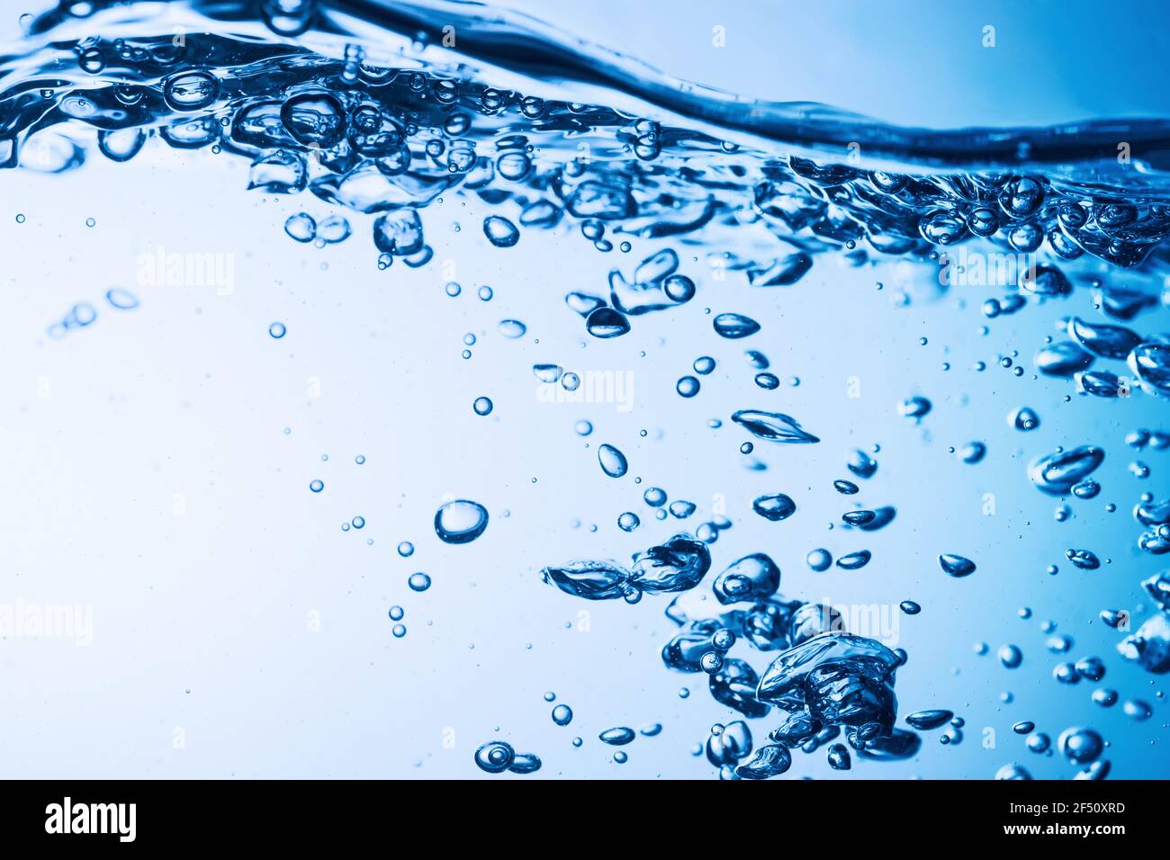 Clear water surface with ripple and bubble Stock Photo - Alamy