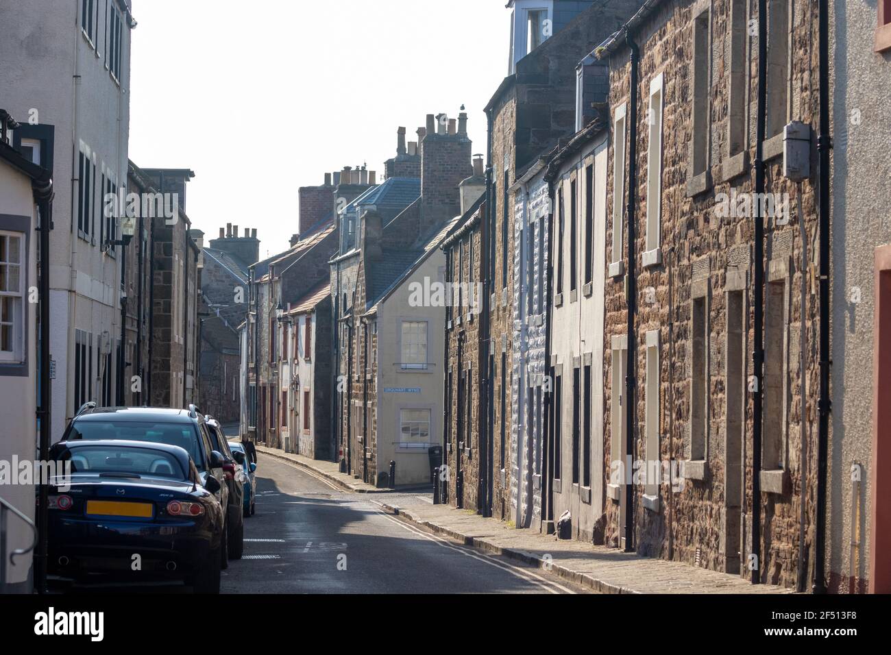 A narrow street in the coastal village of Cellardyke , Fife, SCotland. Stock Photo