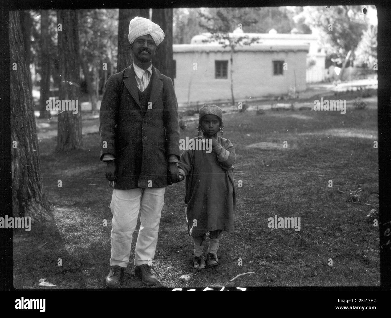 India. Kashmir. Ladakh. Leh. Indian official with his daughter Stock Photo