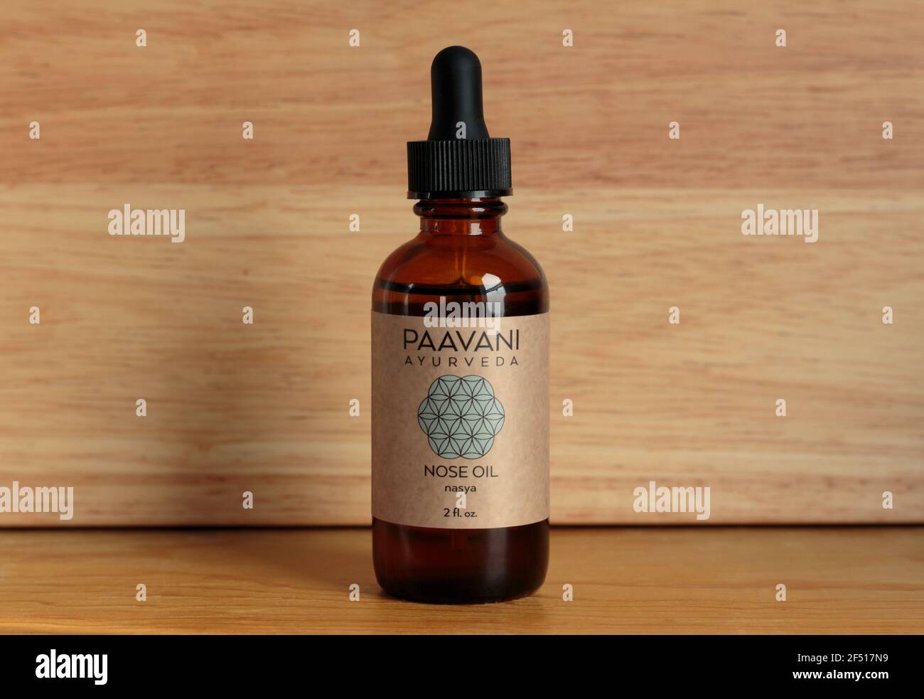 bottle of Paavani brand Ayurvedic nasya nose oil, herb-infused sesame seed oil used to lubricate and clear the nasal passages in Ayurvedic practice Stock Photo