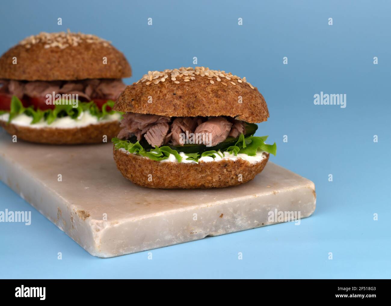 Keto Sandwich with tuna, lettuce, fresh cucumber and tomato slices. The