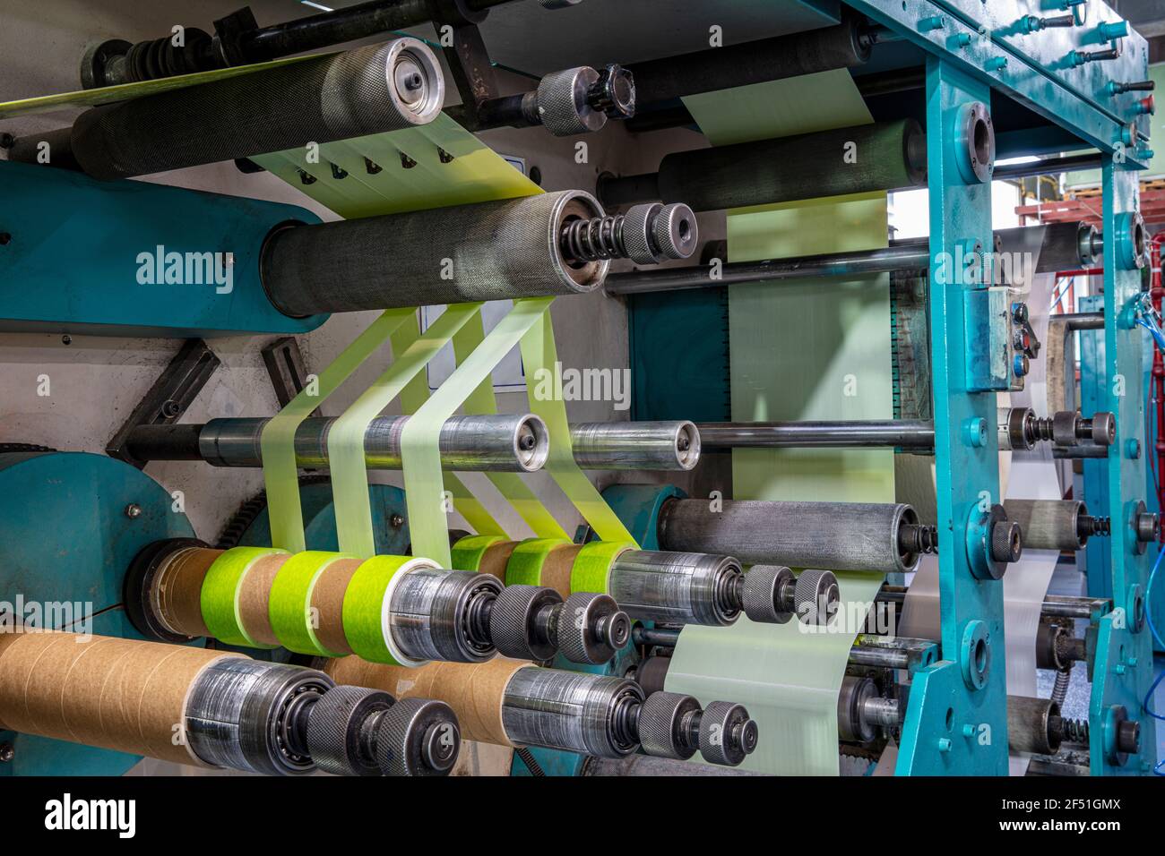 Production of duct tape.Packing tape manufacturing. Strapping Machine