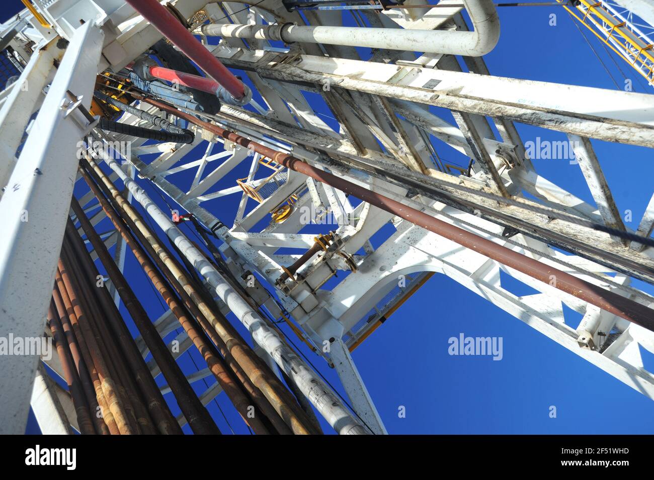 Looking up an offshore drilling rig tower on the main deck of an offshore production platform on Bass Strait Victoria. Stock Photo