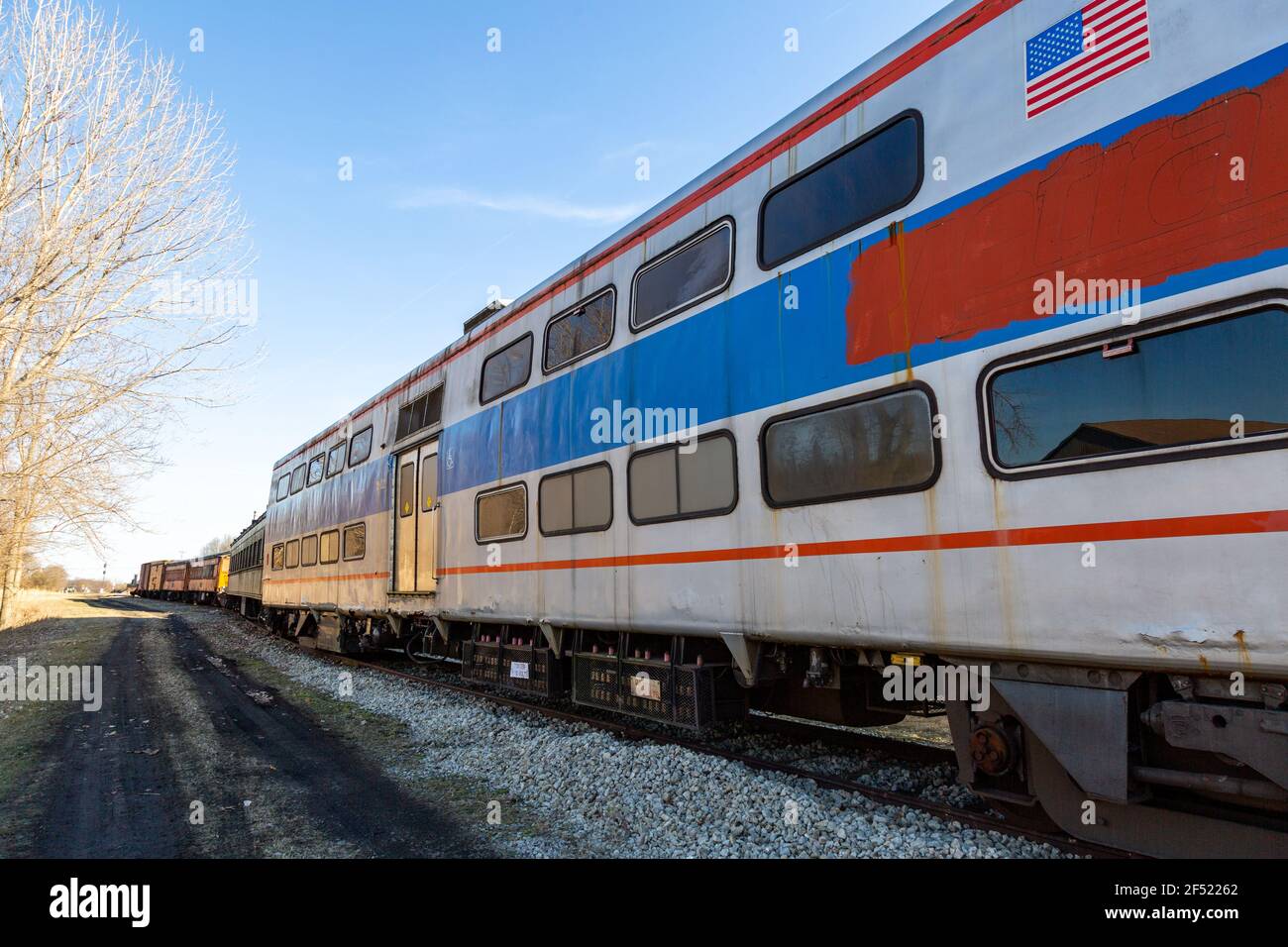 A vintage Metra passenger car sits on display at the Hoosier Valley Railroad Museum in North Judson, Indiana, USA. Stock Photo