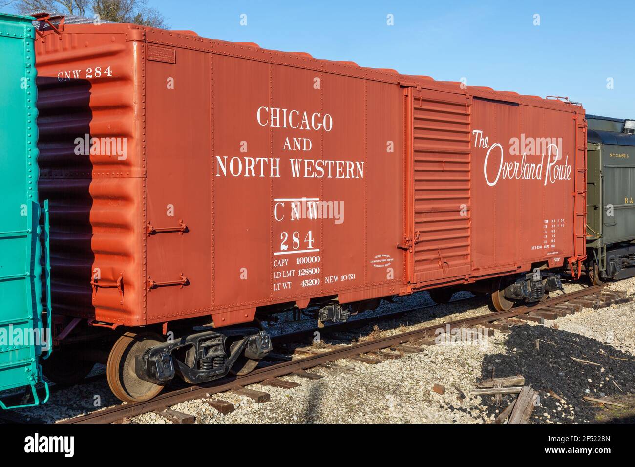 A restored antique orange Chicago and Northwestern RR boxcar sits on display at the Hoosier Valley Railroad Museum in North Judson, Indiana, USA. Stock Photo
