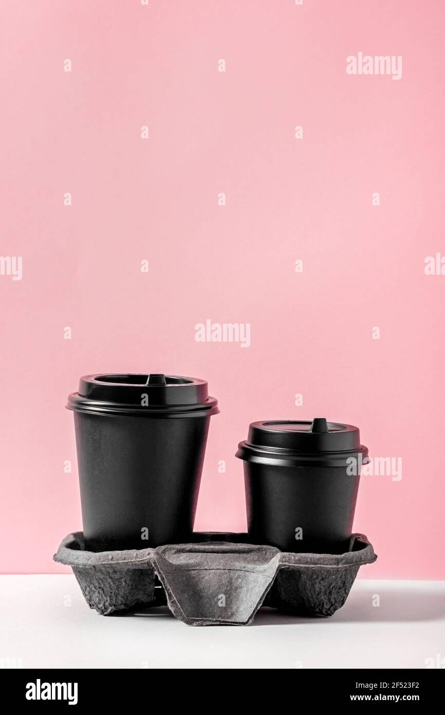 Two recyclable coffee cups in a holder to go Stock Photo Alamy