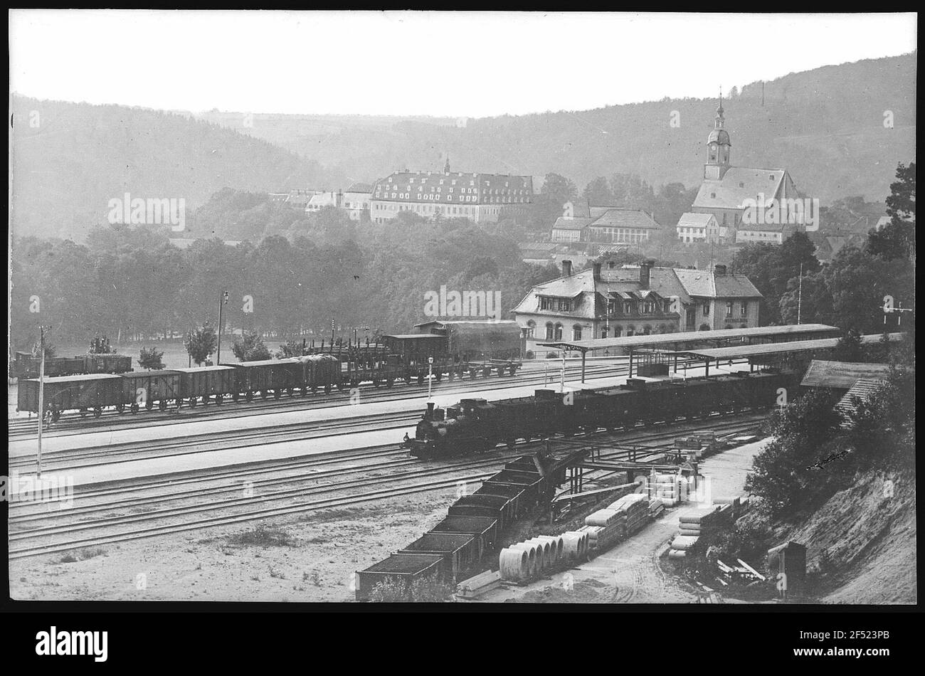 Replacement. Castle and church - train station with railway Stock Photo ...