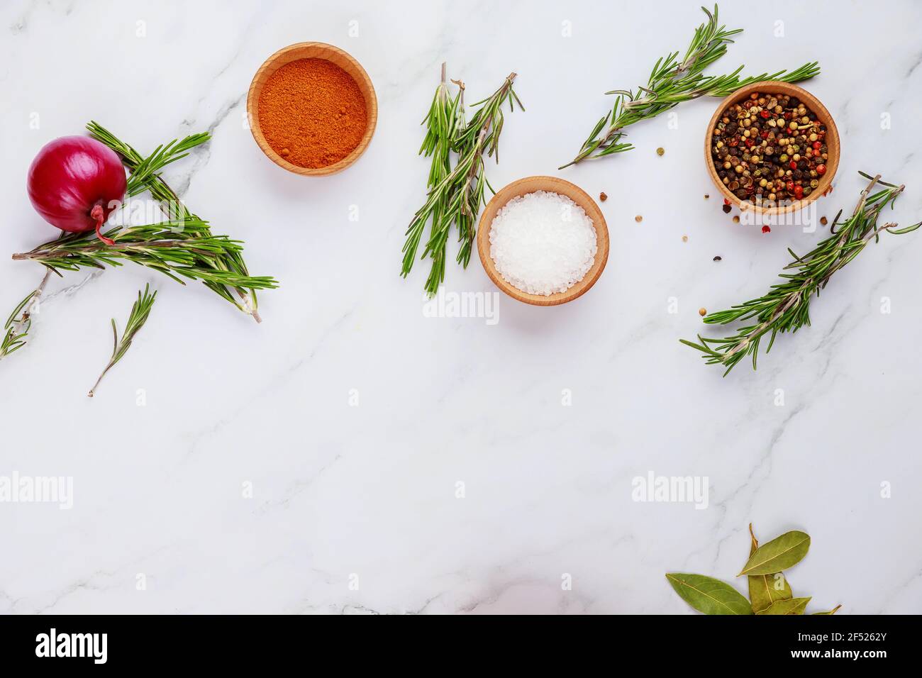 Various herbs and spices on white background. Top view. Stock Photo