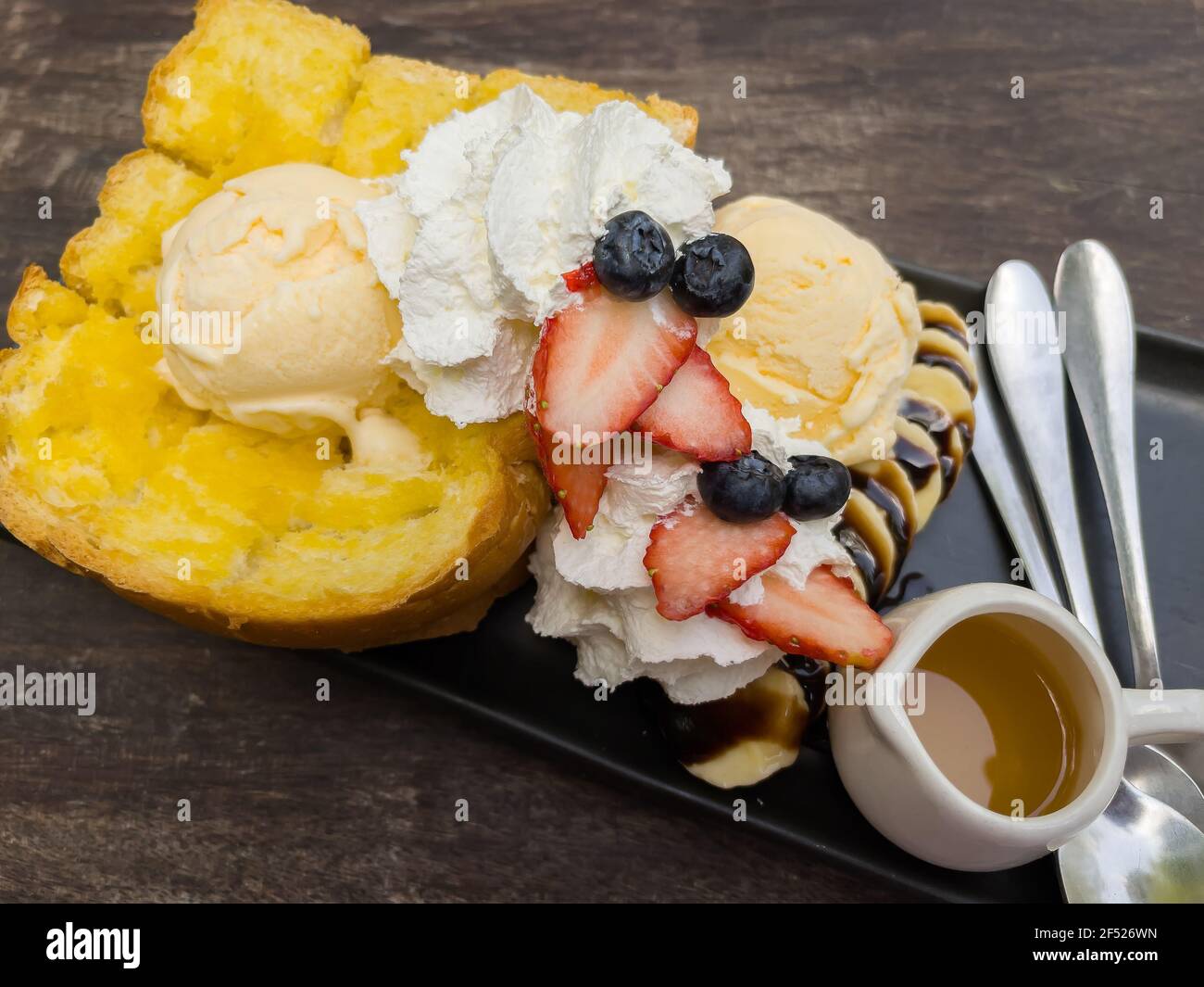 honey toast with ice cream on dish Stock Photo