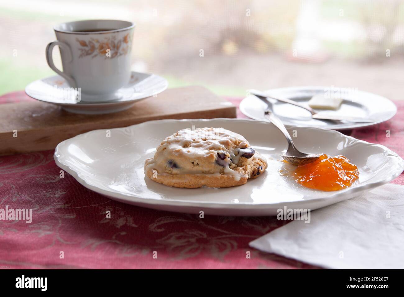 Scone with jam and butter Stock Photo - Alamy