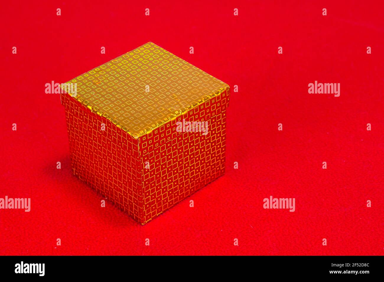 Christmas Gift Box On Red Background Stock Photo