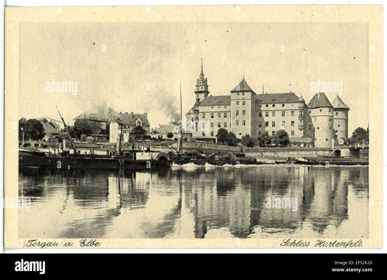Lock Hartfels - Elbe with tractor Torgau. Castle Hartenfels - Elbe with tractor Stock Photo
