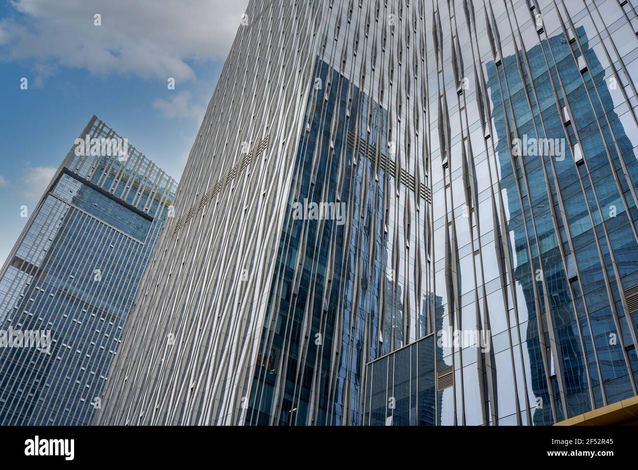Modern architecture high-rise building, glass curtain wall office ...