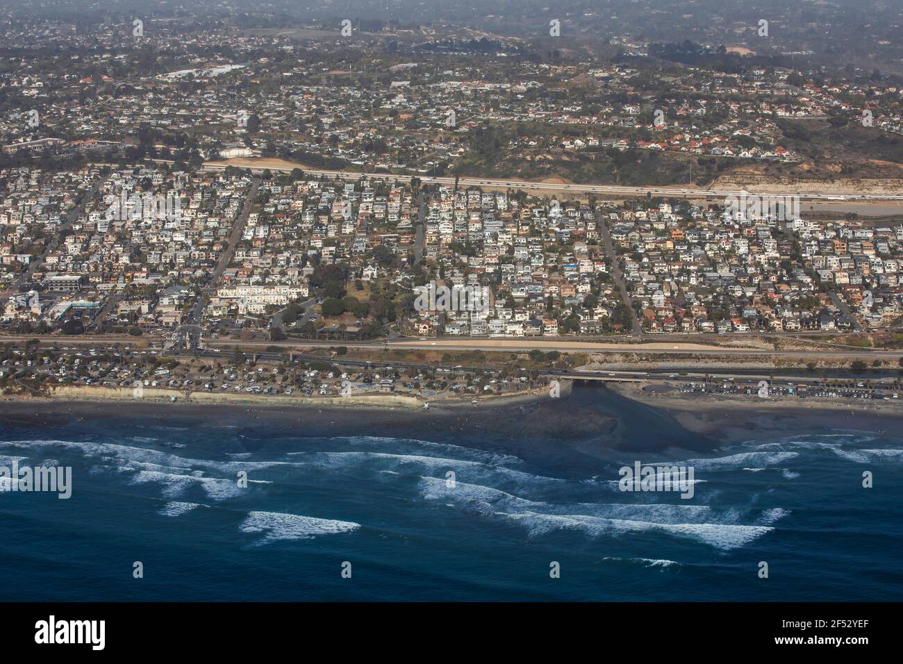 Daytime aerial view of the beach and downtown city area of Encinitas