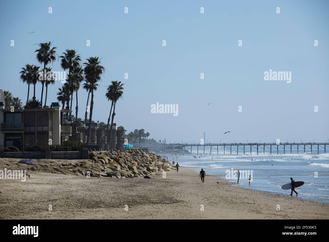 Afternoon view of palm trees and beach of downtown Oceanside, California, USA. Stock Photo