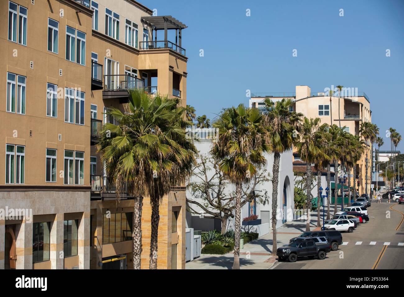 Palm tree lined view of downtown Oceanside, California, USA. Stock Photo