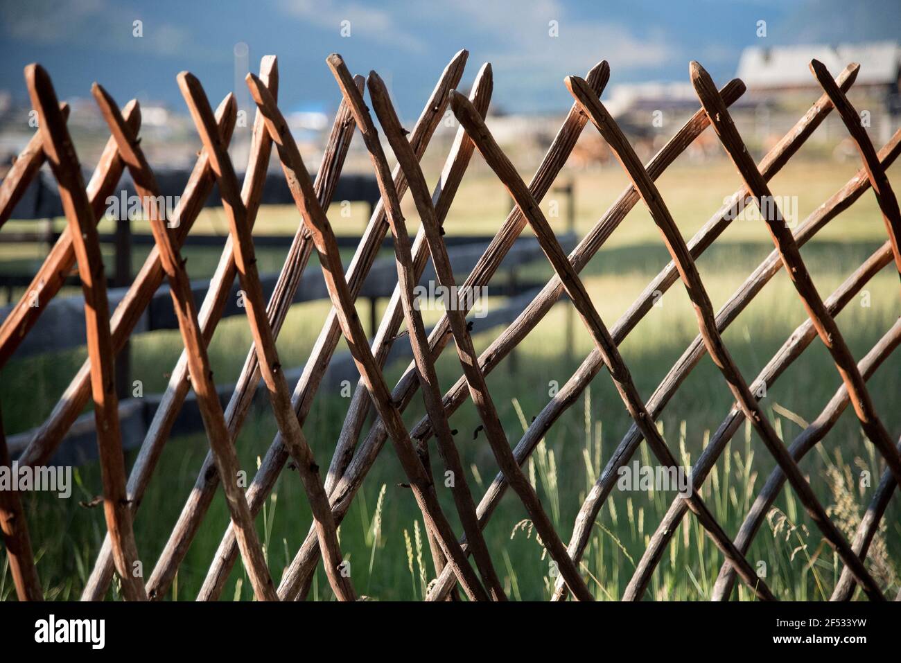Wooden fence in the highlands and blue sky with clouds Stock Photo - Alamy