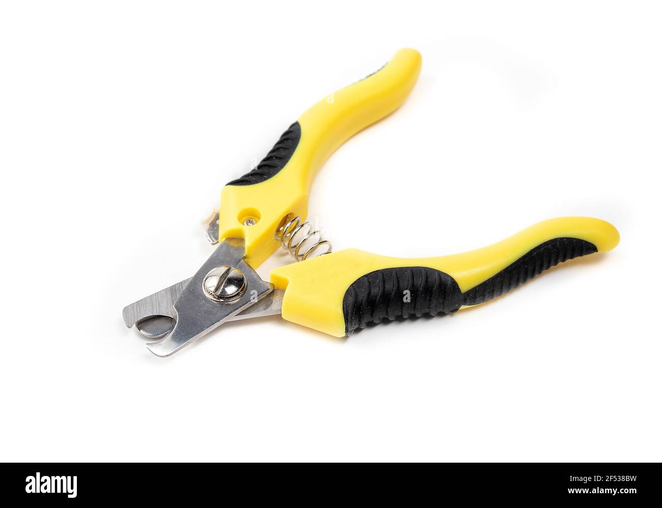 Dog nail trimmer with open blades. Yellow black scissor style clipper with two stainless steel blades. Used by groomers and pet owners to keep dog cla Stock Photo