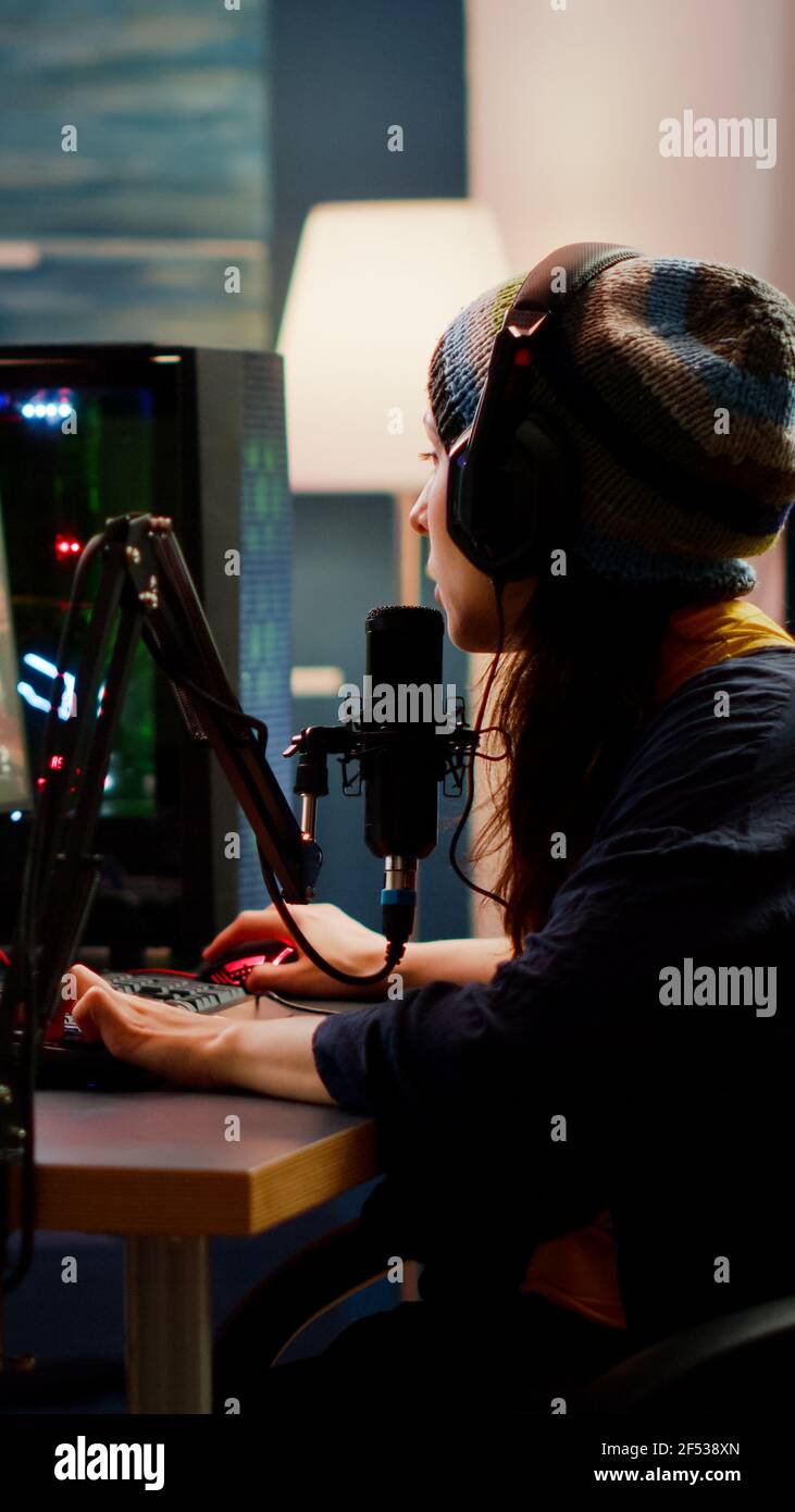 Woman streamer checking sound using professional mixer for streaming ...