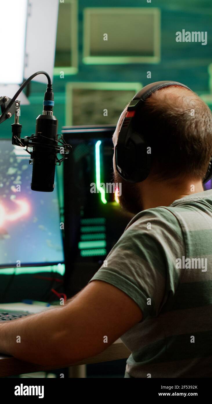 Man streamer cyber checking sound hi-res stock photography and images ...