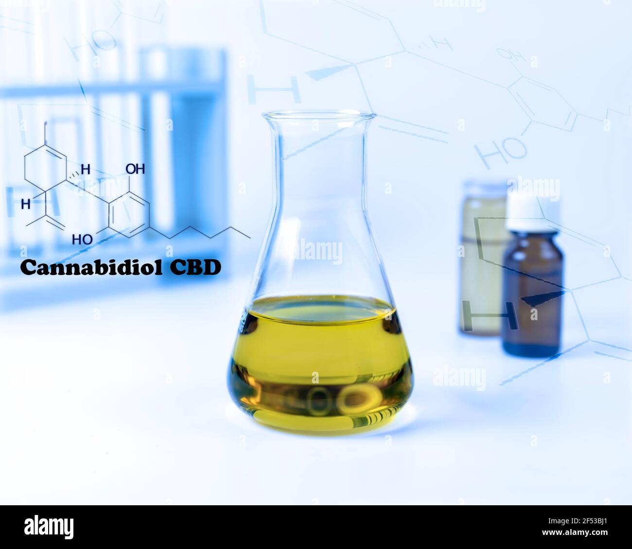 Cannabidiol (CBD) cannabis oil in glass beaker cool tone light name and chemical structure. Stock Photo