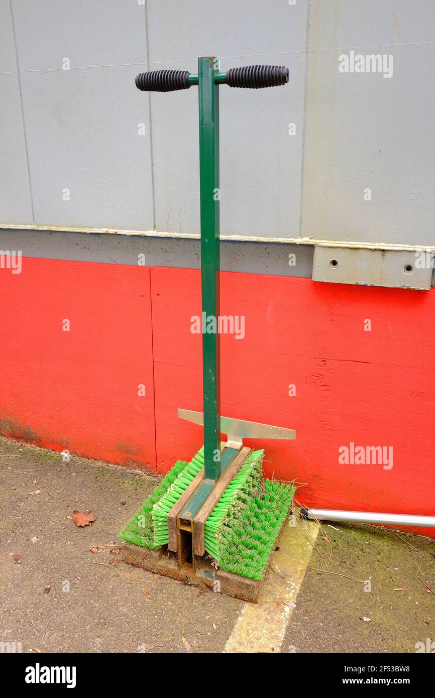 March 2021  - Boot cleaning device out side the offices on a British Construction site Stock Photo