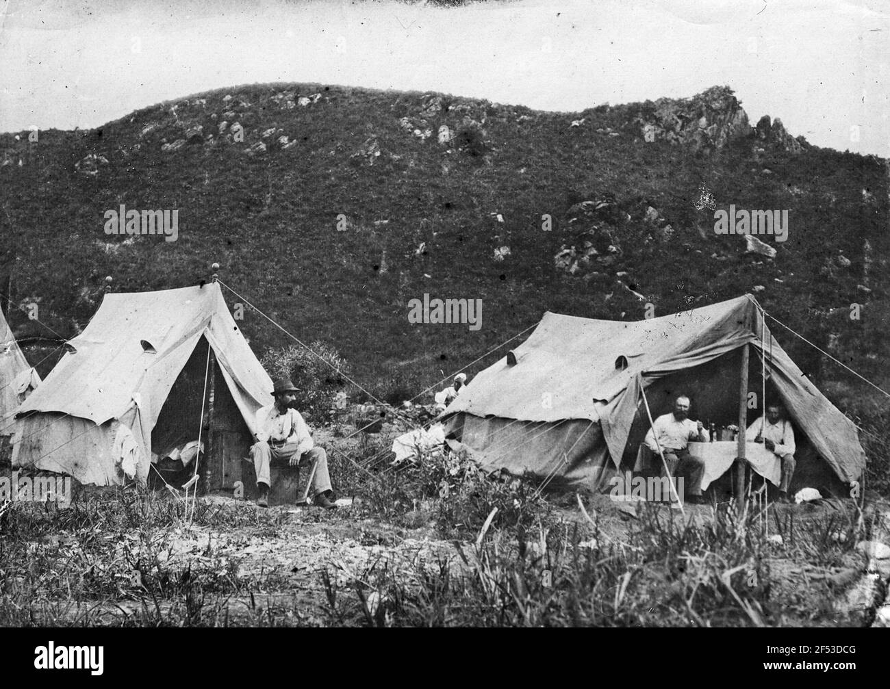 Expedition leader Bruno Bone Hauer with his brother-in-law Richard  Zimmermann (left) in the field camp in Tankoga (location of the first  German gold mine Stock Photo - Alamy