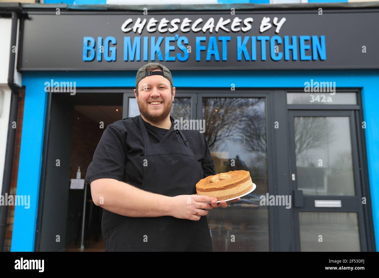Previously unissued photo dated 09/02/21 of Mike Jones outside his Big Mike's Fat Cheesecake store in Carlton, Nottingham. After being furloughed from his job as a service adviser with Audi, Mike turned his hand to baking and opened his own cheesecake shop. Issue date: Wednesday March 24, 2021. Stock Photo
