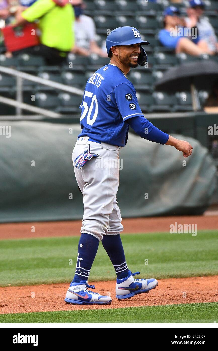 Mookie Betts of the Los Angeles Dodgers jokes during a MLB spring