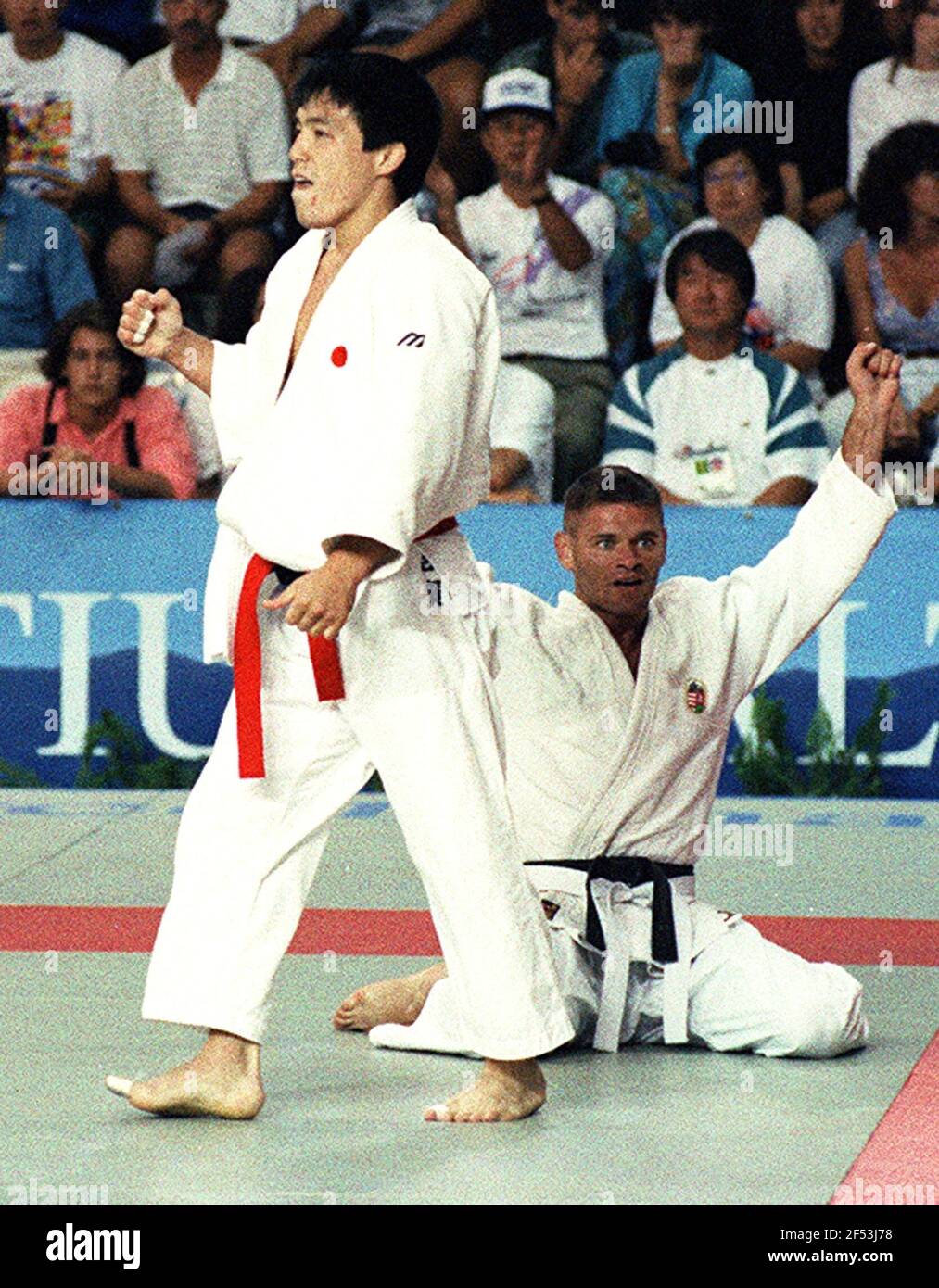 File photo taken in 1992 shows Toshihiko Koga (L) reacting after his  victory in the men's judo 71-kilogram final at the Barcelona Olympics. Koga  died on March 24, 2021, at age 53. (