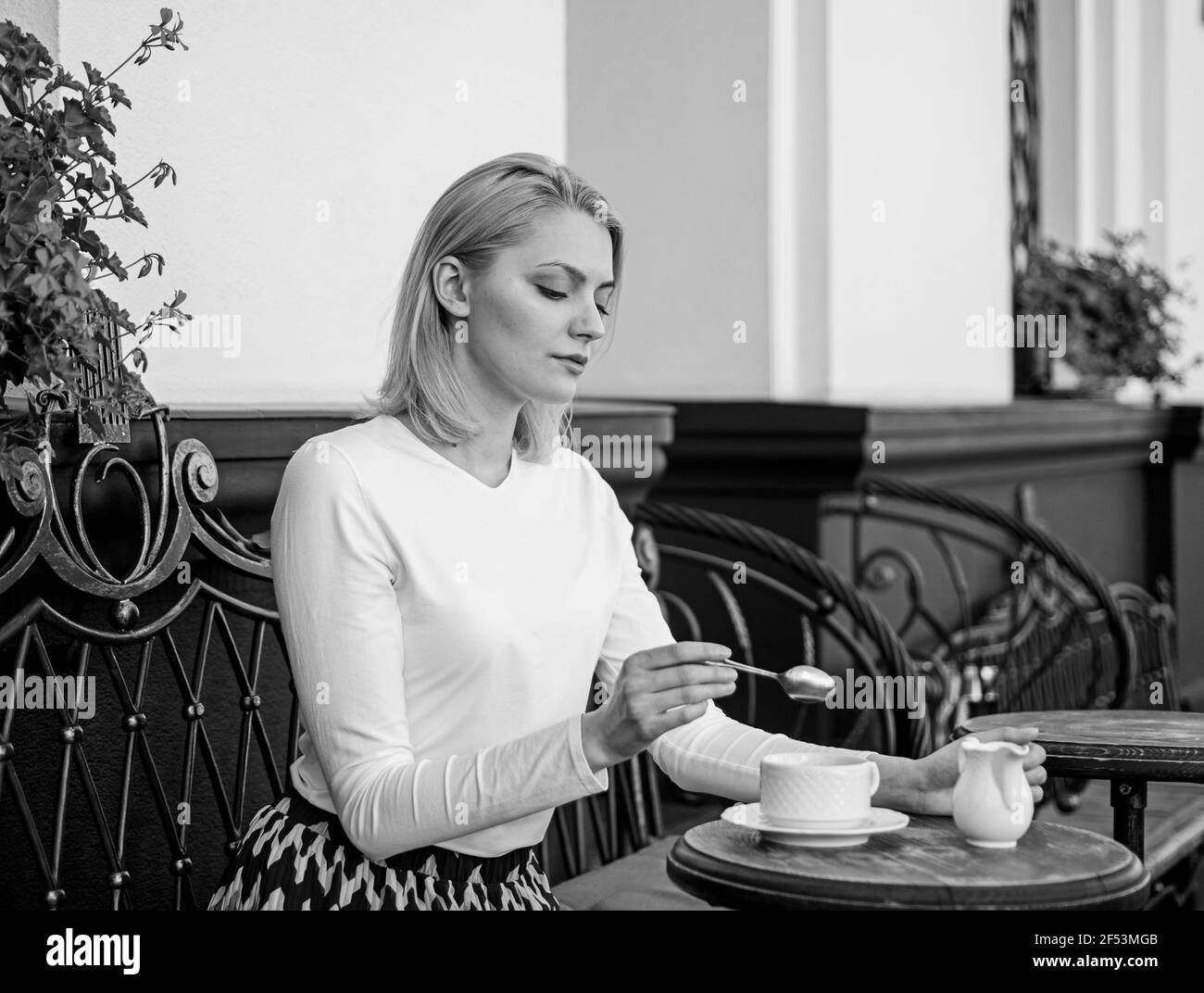 Traditional tea with milk. Woman elegant calm face have drink cafe
