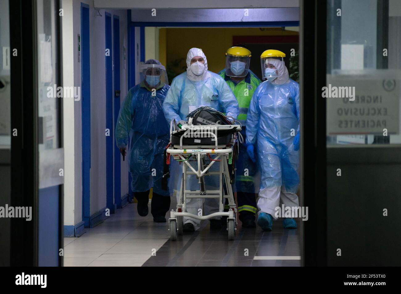 Santiago, Metropolitana, Chile. 24th Mar, 2021. SAMU staff leaves the Metropolitan Hospital after transferring a covid-positive and intubated patient. Credit: Matias Basualdo/ZUMA Wire/Alamy Live News Stock Photo