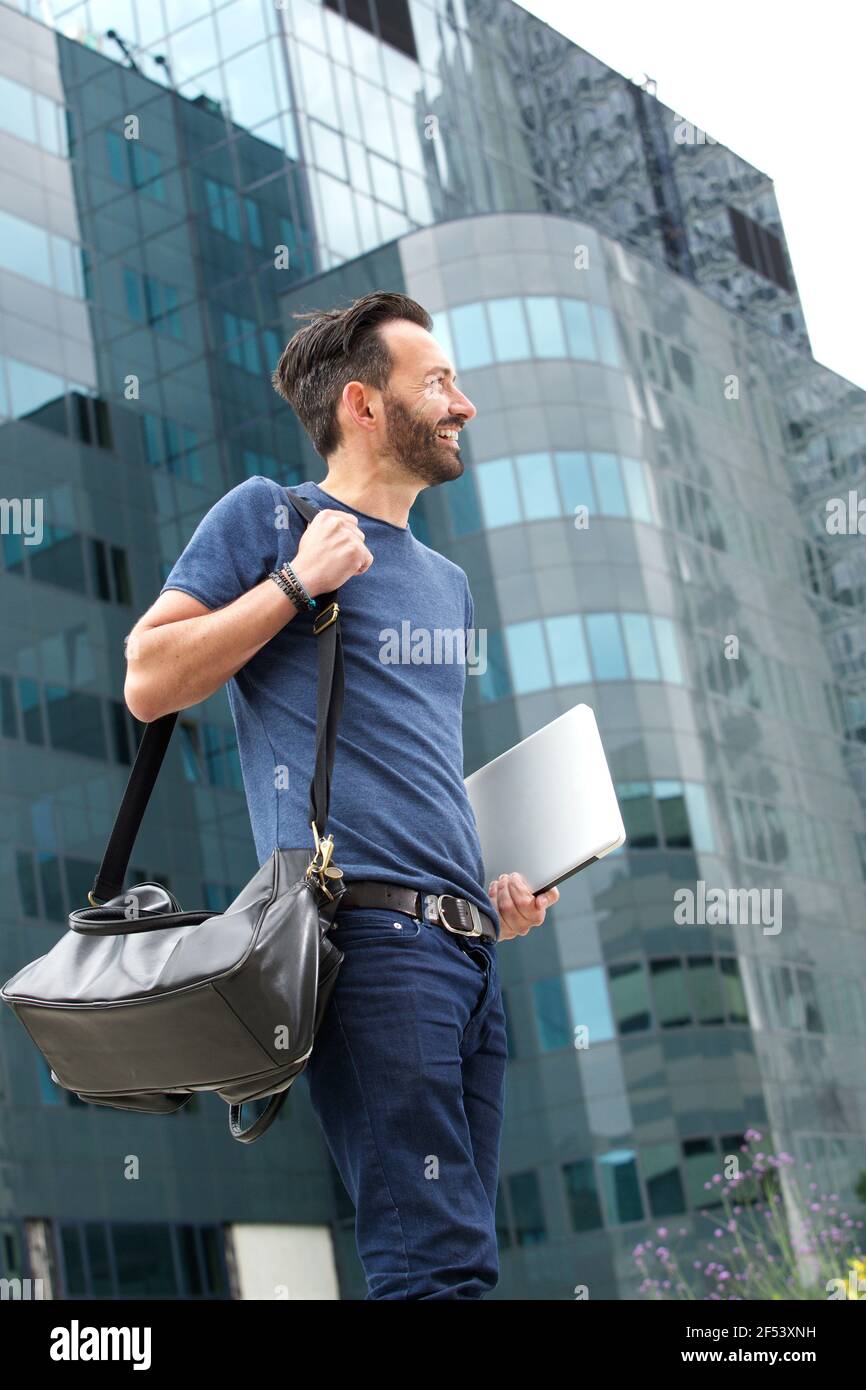 Mature man walking outdoors hi-res stock photography and images - Alamy